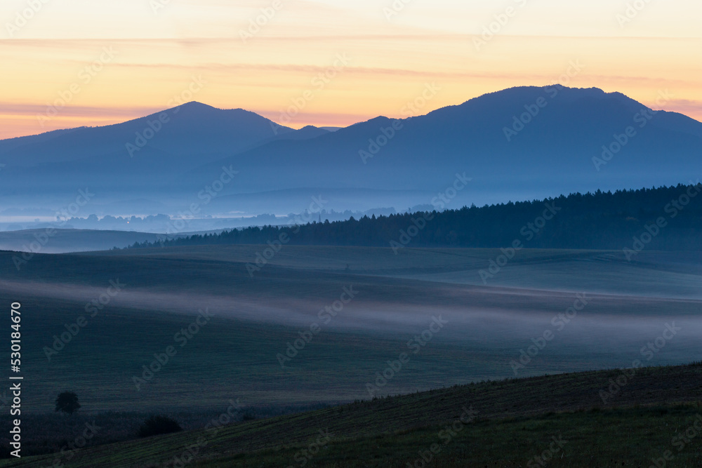 Obraz premium Morning mist at Ondrasova village, Slovakia.