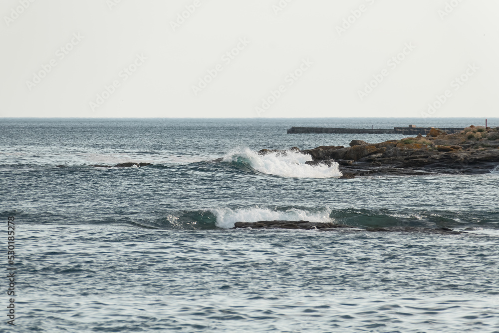 seascape with waves crashing with the rocks seascape with waves crashing with the rocks
