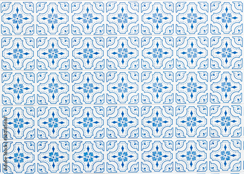 Classic ornamental mosaic of tiles blue and white with winter flower in the center 