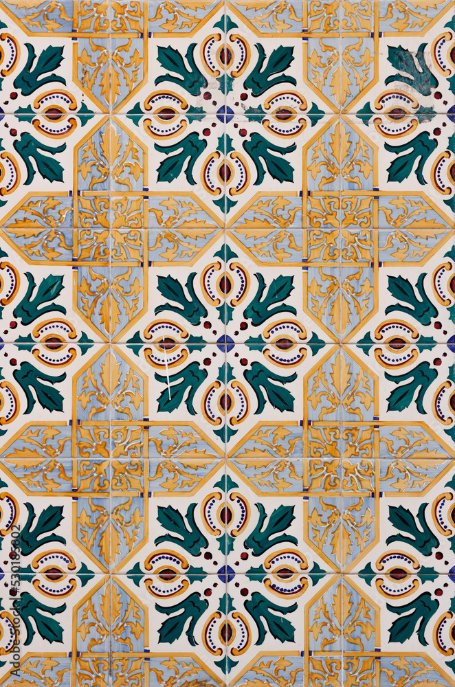 vertical golden classic mosaic of tiles with leaves and ornamental details