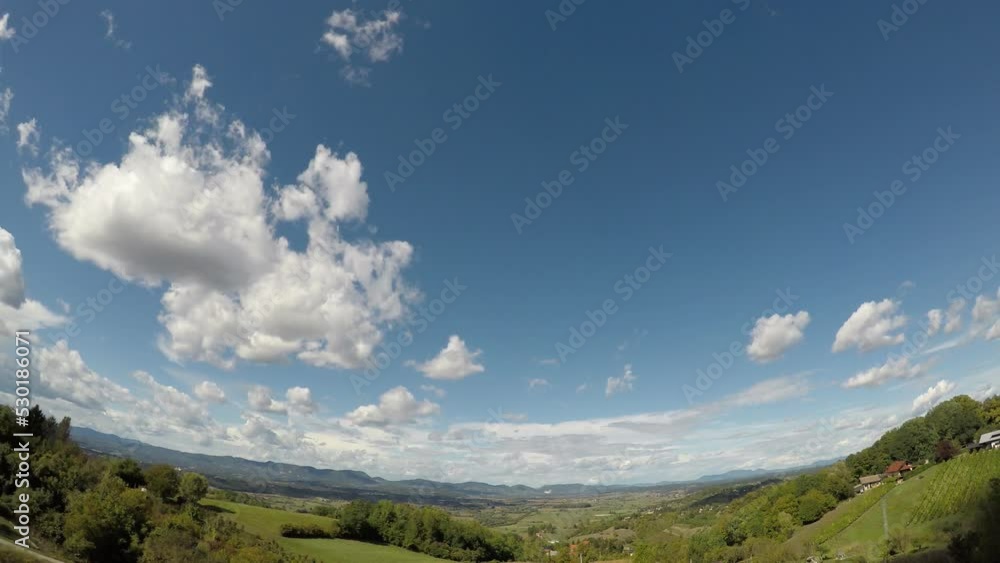 white clouds are floating in the sky, thereby covering the shot at about 300 meters in height, late summer, early afternoon, central Europe, hilly area white clouds are floating in the sky, thereby covering the shot at about 300 meters in height, late summer, early afternoon, central Europe, hilly area