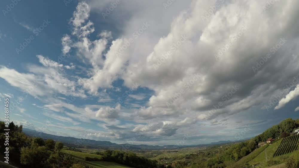 white clouds are floating in the sky, thereby covering the shot at about 300 meters in height, late summer, early afternoon, central Europe, hilly area white clouds are floating in the sky, thereby covering the shot at about 300 meters in height, late summer, early afternoon, central Europe, hilly area