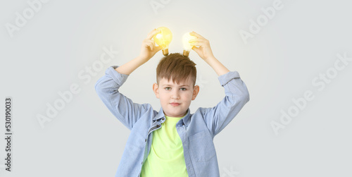 Cute little boy with glowin...