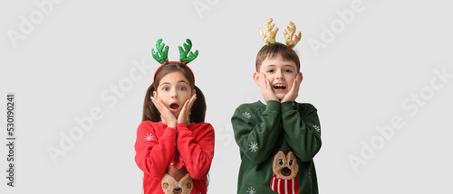 Funny surprised little chil...