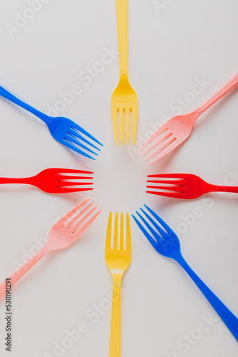 Set of Multicolored plastic forks in symmetric shape