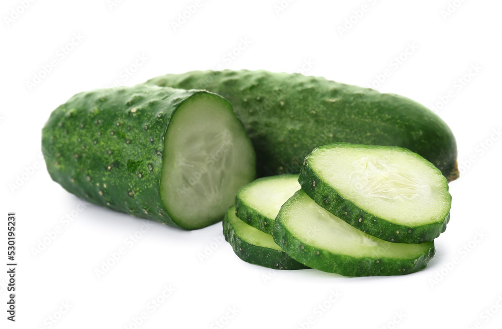Whole and cut cucumbers on white background Whole and cut cucumbers on white background