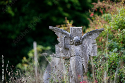 statue of an angel in a cemetery