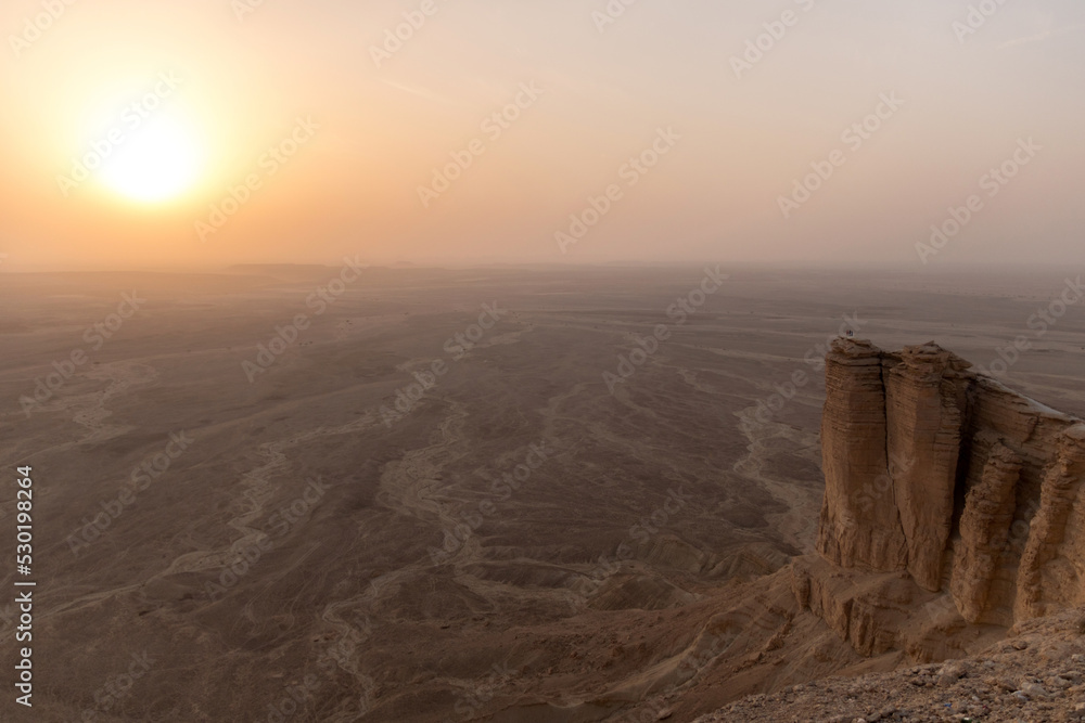 Sunset at the edge of the world near riyadh, saudi arabia