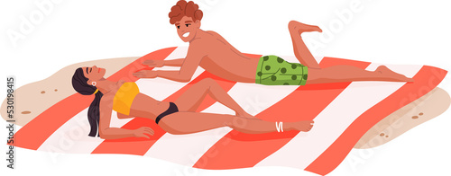 Obraz na plátne Young man and woman sunbathing on the beach sand
