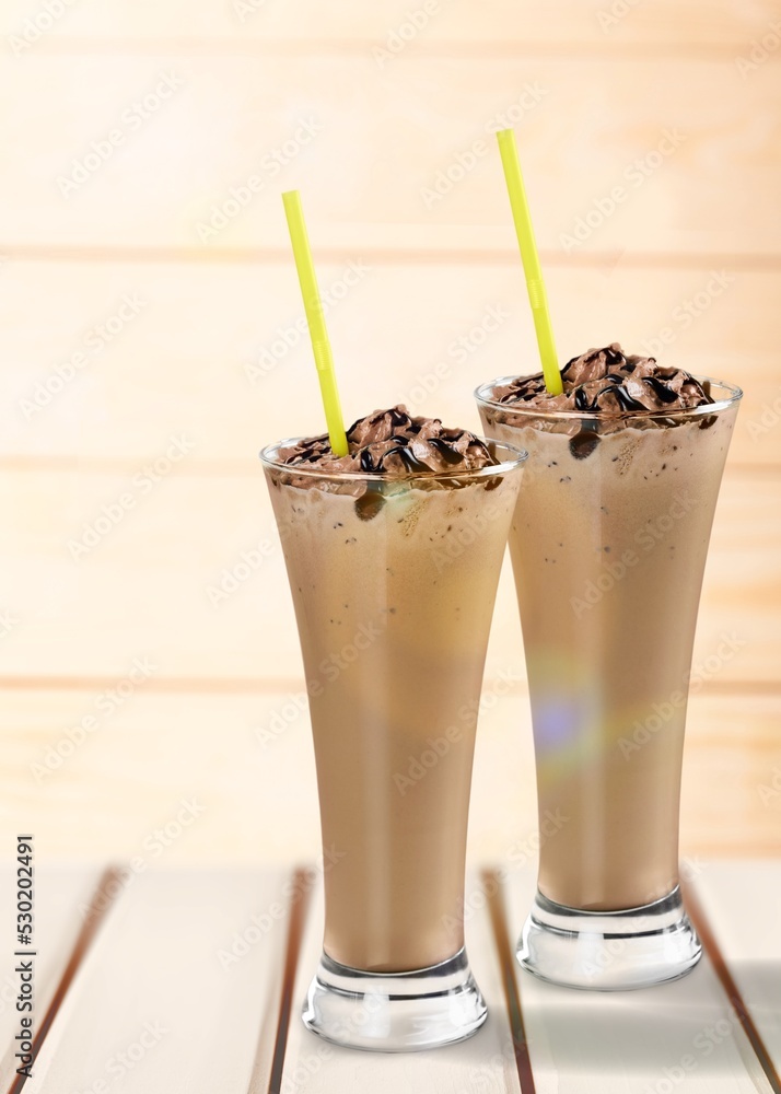 Coffee in glass with cream and milk. Summer drinks Coffee in glass with cream and milk. Summer drinks