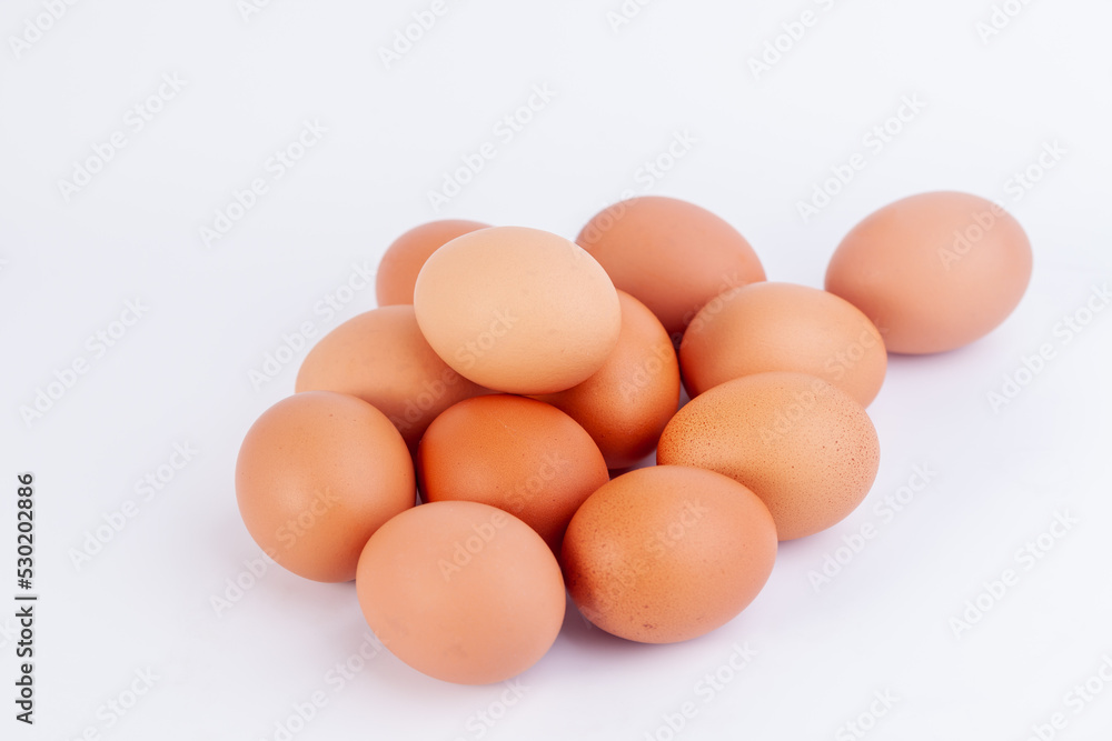 Several chicken eggs are placed on a white background... Several chicken eggs are placed on a white background...