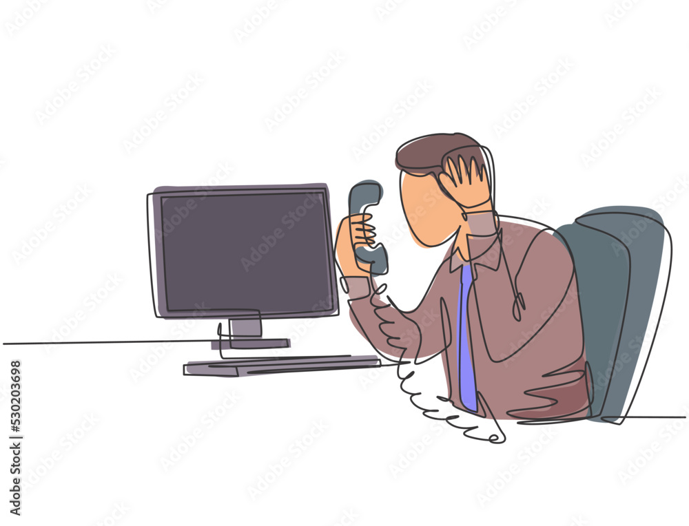 Single continuous line drawing of young angry worker mad at phone call beside pile of papers on his desk. Anger management at the office concept one line draw graphic design vector illustration