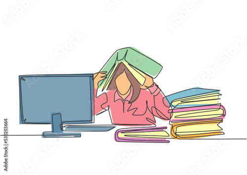 One single line drawing of young depression female employee sitting in front of computer and stack of papers and covered her head with folder. Worker concept continuous line draw design illustration