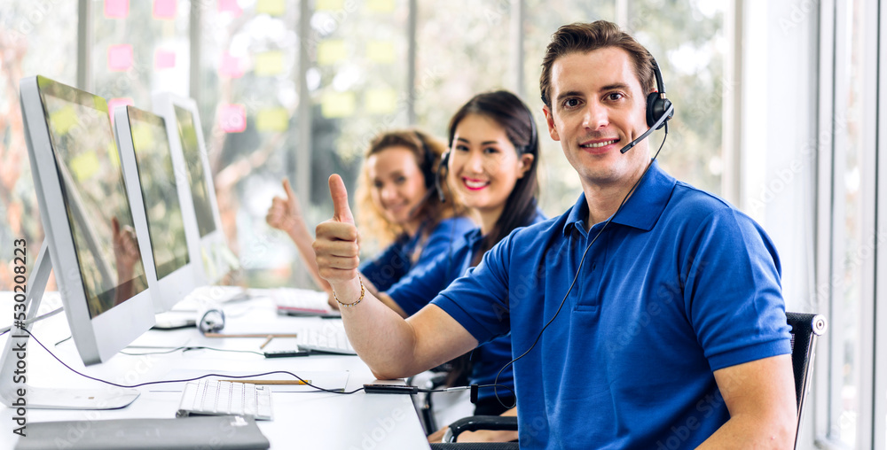 Group of happy call center smiling business operator customer help