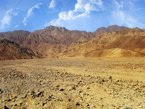 Small rocks in Egypt on the sea coast under the clouds