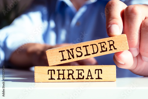 Wooden blocks with words 'Insider Threat'. Business concept
