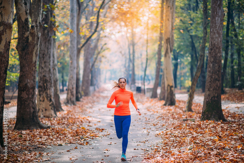 Woman Jogging Outdoors in Park