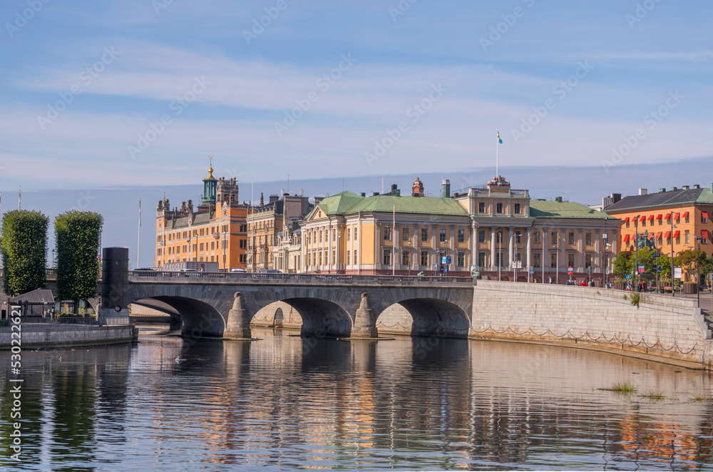 Facades and roof of The Government Offices, Rosenbad, prime minister resident, Sagerska Palatset, and the tower of The Town City Hall, Stadshuset, a sunny autumn day i Stockholm Facades and roof of The Government Offices, Rosenbad, prime minister resident, Sagerska Palatset, and the tower of The Town City Hall, Stadshuset, a sunny autumn day i Stockholm