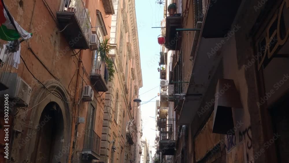 Downwards Pan Of A Tight Sidestreet Within Downtown Napoli On A Dry And Sunny Day Downwards Pan Of A Tight Sidestreet Within Downtown Napoli On A Dry And Sunny Day