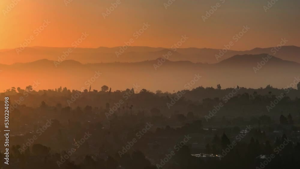custom made wallpaper toronto digitalA beautiful hazy sunrise over Cowles Mountain in southern San Diego California, USA, drone orbit tight shot.