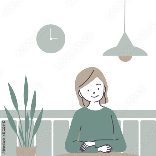カフェで待ち合わせをする女性
