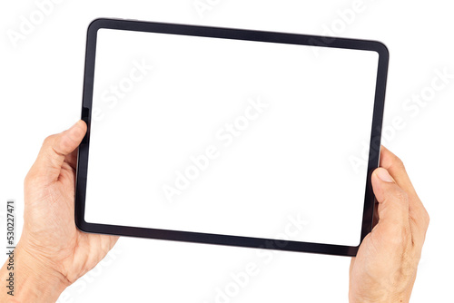 Hand man holding tablet with mockup blank screen isolated on white background with clipping path photo