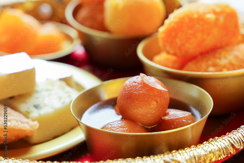 Gulab jamun gulaab jamun sugar syrup golden bowl Indian sweet food mithai Egyptian Zalabia balls dessert Diwali sweets Dussehra Holi ganesh chaturthi Ram navmi Ramadan Pakistan India Sri Lanka Kerala Gulab jamun gulaab jamun sugar syrup golden bowl Indian sweet food mithai Egyptian Zalabia balls dessert Diwali sweets Dussehra Holi ganesh chaturthi Ram navmi Ramadan Pakistan India Sri Lanka Kerala