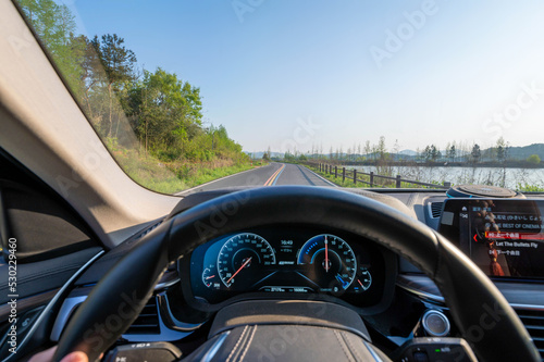 The interior of the car, the scenery along the way, and the rainbow highway from the perspective of the main driver's seat, taken on the road of Liyang No. 1 in Changzhou, Jiangsu Province, China photo