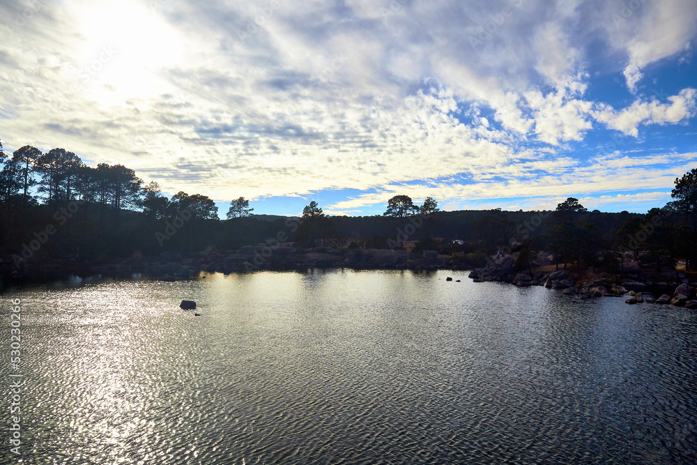 lake with backlighting clouds in the sky and fores, in mexiquillo durango lake with backlighting clouds in the sky and fores, in mexiquillo durango