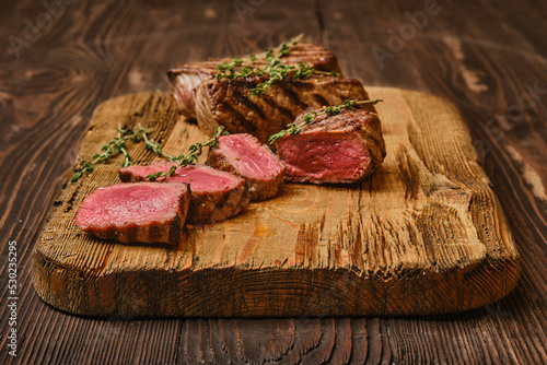 Grilled beef tri tip loin steak, medium rare photo