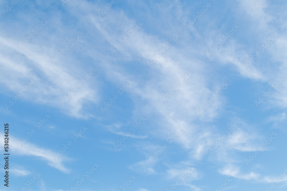 White fluffy clouds in the blue sky. Blue sky background and white clouds soft focus, pastel sky White fluffy clouds in the blue sky. Blue sky background and white clouds soft focus, pastel sky