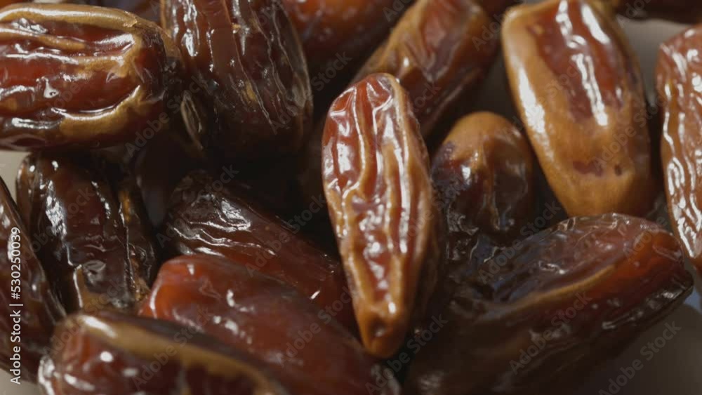 a bunch of dried dates rotate in a circle a bunch of dried dates rotate in a circle