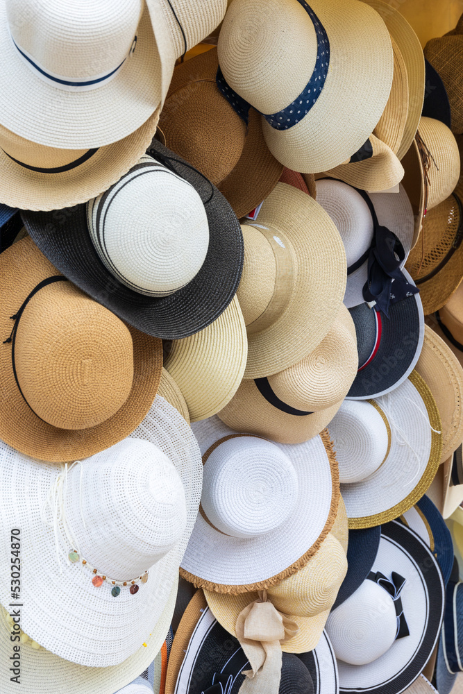 straw hats in the market stall