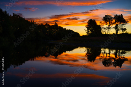 Mangainatoka River reflections at sunset, Pahiatua, New Zealand © Scott