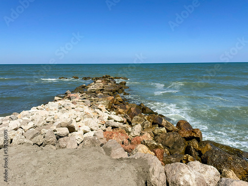 Felsen am Adriatischen Meer in Comacchio Italien photo