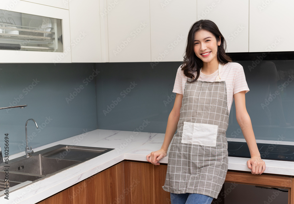 Image of young Asian woman at home Image of young Asian woman at home