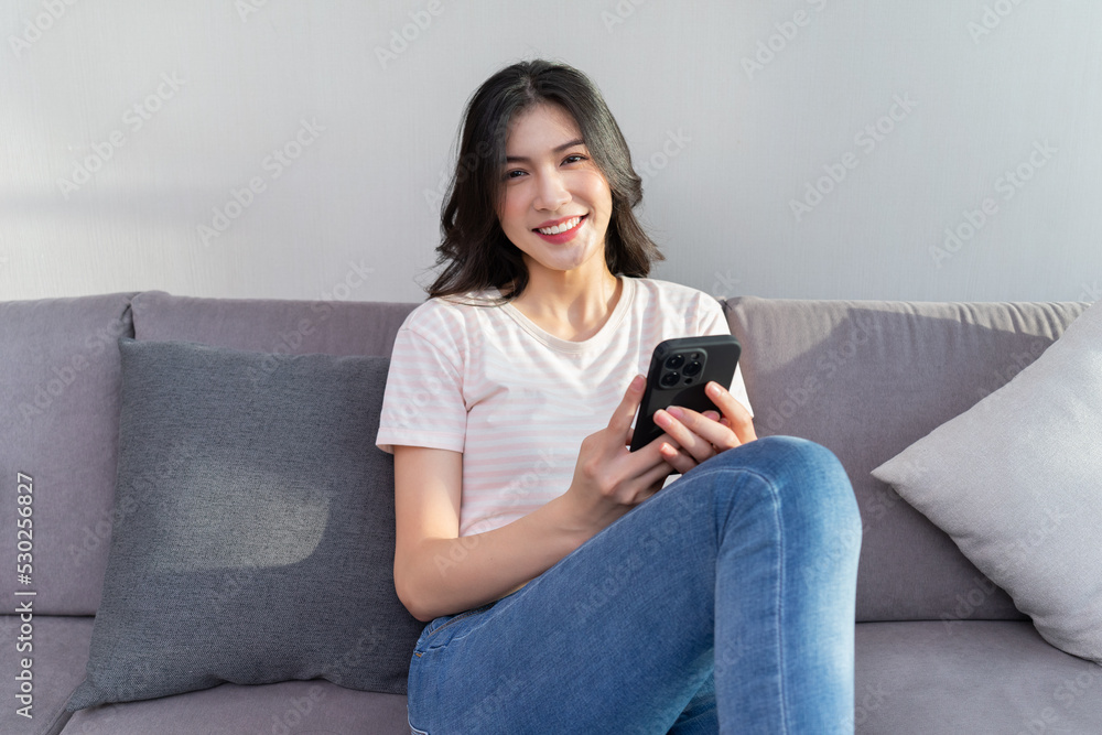 Obraz premium Image of young Asian woman at home