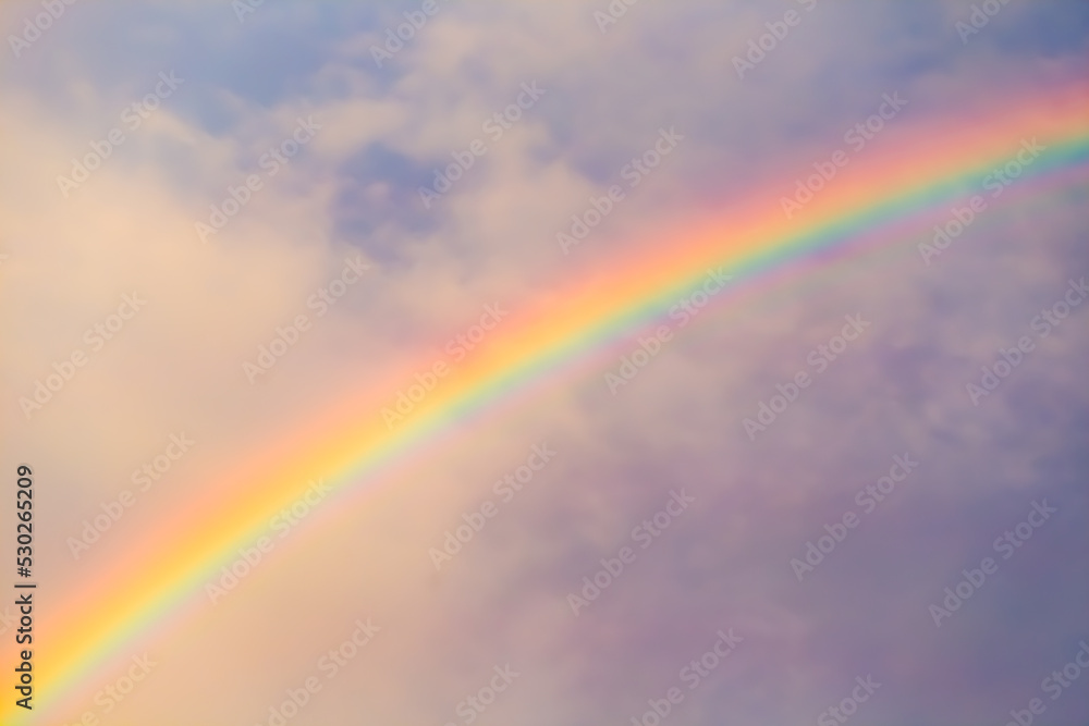 sky with clouds and rainbow