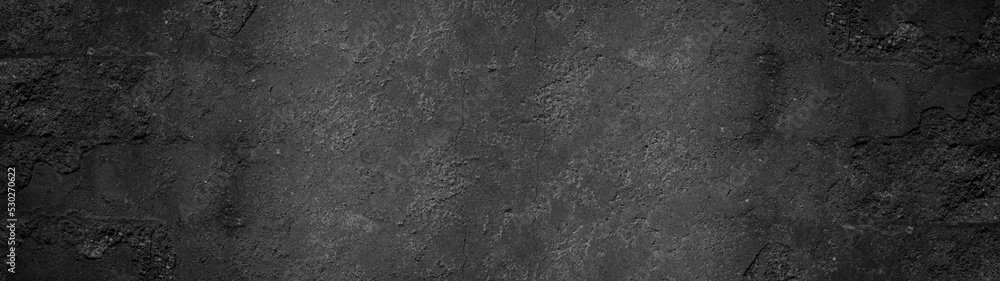 Old aged damaged cracked grunge black anthracite gray dark concrete cement plaster facade wall texture background banner long pattern Old aged damaged cracked grunge black anthracite gray dark concrete cement plaster facade wall texture background banner long pattern