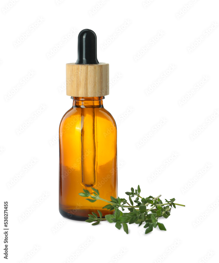 Bottle of essential oil and thyme isolated on white Bottle of essential oil and thyme isolated on white