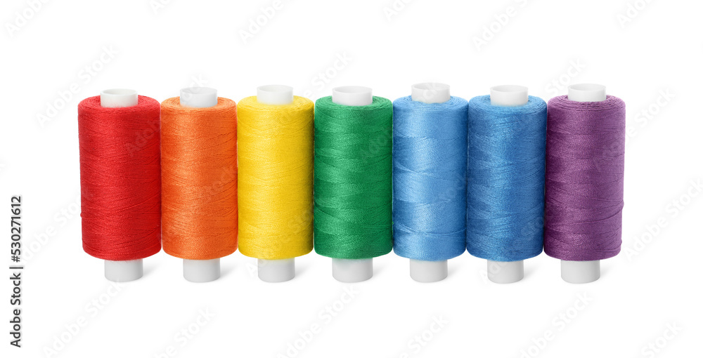 Set of different colorful sewing threads on white background Set of different colorful sewing threads on white background