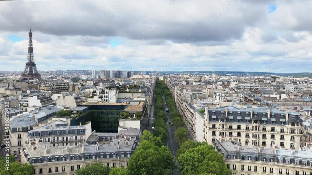 TOUR EIFFEL, EIFFEL TOWER, France, Paris. Clear summer day. View from the triumphal arch. The famous French monument in the historical center of the city. The most visited attraction in the world. TOUR EIFFEL, EIFFEL TOWER, France, Paris. Clear summer day. View from the triumphal arch. The famous French monument in the historical center of the city. The most visited attraction in the world.