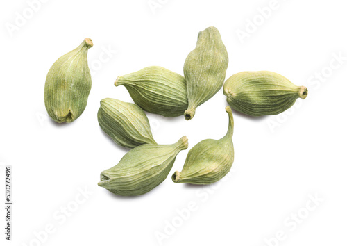 Pile of dry green cardamom pods on white background, top view
