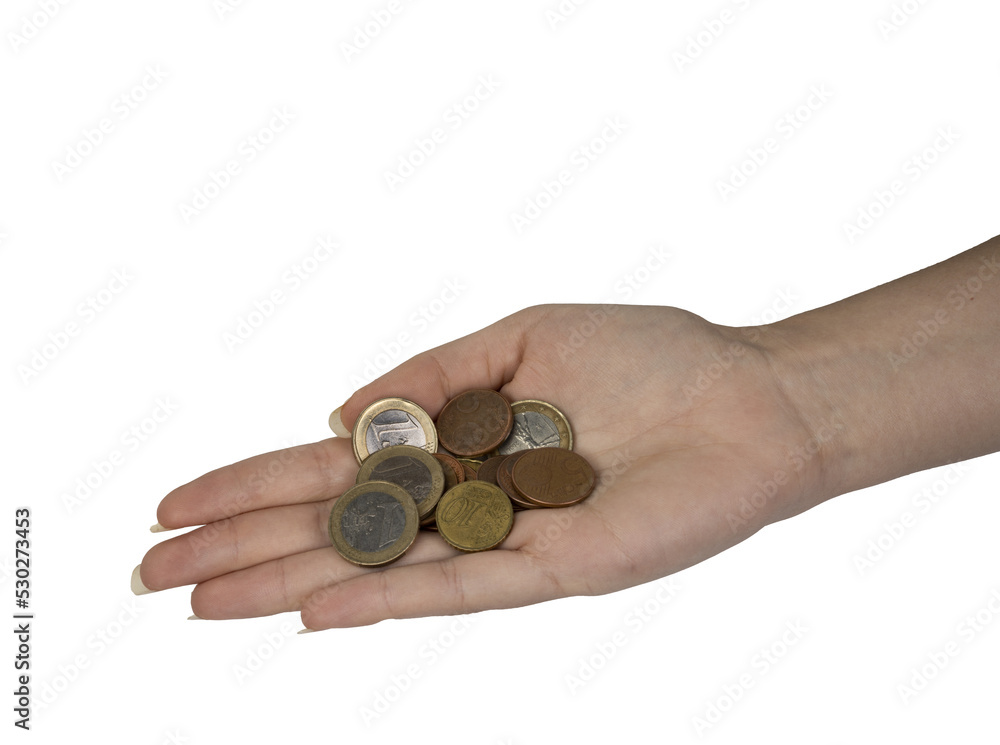 a few euro coins in the female hand on an isolated background a few euro coins in the female hand on an isolated background