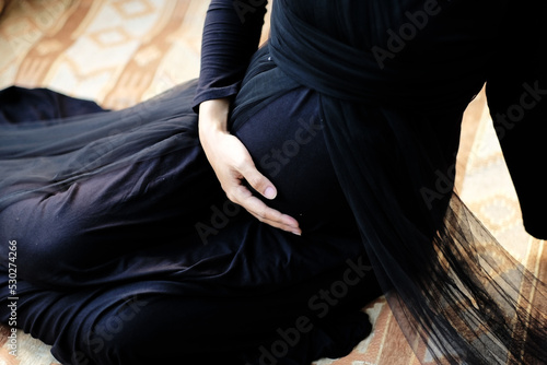 Maternity couple photoshoot with black clothes theme