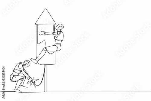 Single one line drawing robot ignite firework rocket while his teammates prepare to fly on the rocket. Modern robotic artificial intelligence. Continuous line draw design graphic vector illustration