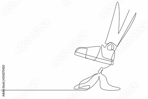 Continuous one line drawing robot leg step on business banana peel. Imminent danger, banana peel underfoot. Business risk. Humanoid robotic cybernetic organism. Single line design vector illustration