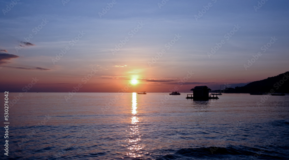 Sunrise with boat ship. West Bali, Indonesia Sunrise with boat ship. West Bali, Indonesia