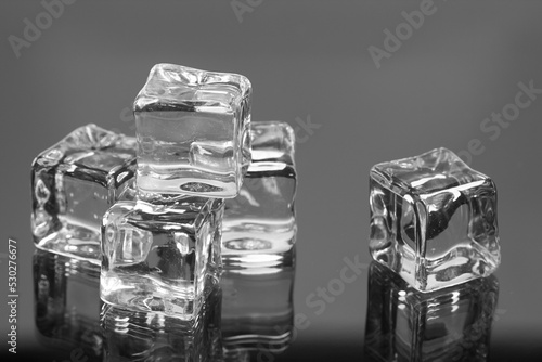 ice cubes on the glass background