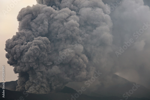 Smoke and ash erupting Mt Bromo Java Indonesia
